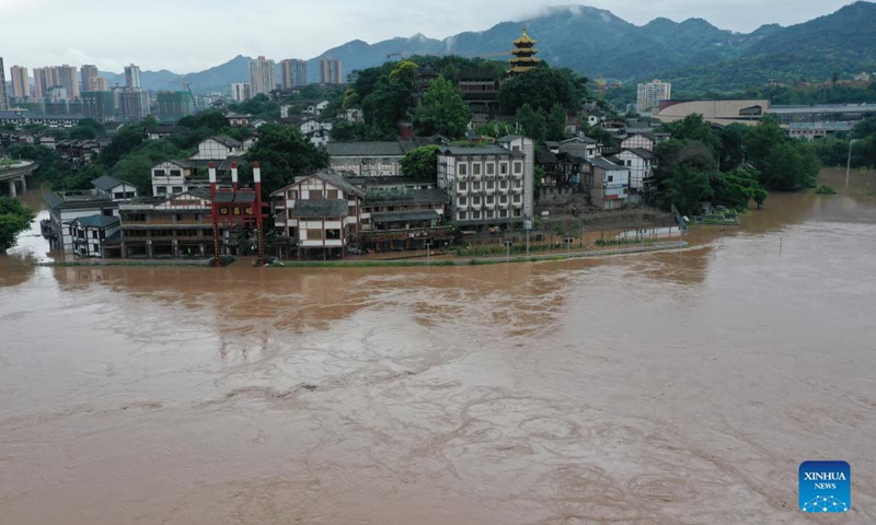 Aerial photo taken on Sept. 6, 2021 shows the flood-affected area in Ciqikou, southwest China's Chongqing Municipality. The emergency response for flood control was upgraded from level IV to III on Monday, according to Chongqing's flood control and drought relief headquarters, as Jialing River in Chongqing witnessed rapidly increasing water levels following constant heavy rainfall. (Photo: Xinhua)
