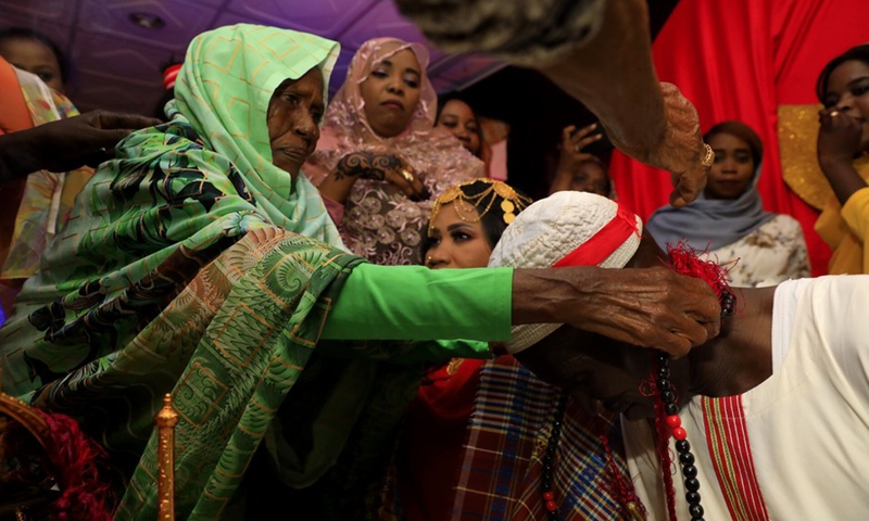 Photo taken on Sept. 10, 2021 shows the Jirtig ritual, an ancient Sudanese tradition associated mostly with wedding ceremonies.(Photo: Xinhua)
