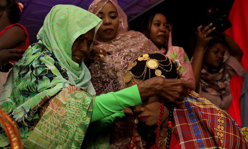 Photo taken on Sept. 10, 2021 shows the Jirtig ritual, an ancient Sudanese tradition associated mostly with wedding ceremonies.(Photo: Xinhua)