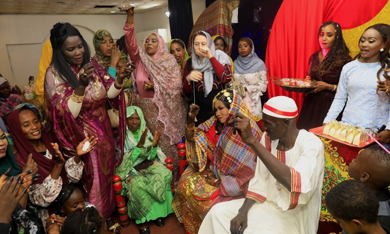 Photo taken on Sept. 10, 2021 shows the Jirtig ritual, an important part of traditional wedding in Sudan.(Photo: Xinhua)