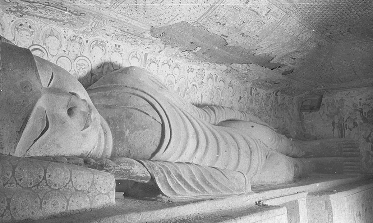 Mogao Cave 158. Middle Tang (781–848) Reclining Buddha, Parinirva¯n?a scene. West wall. Lo Archive photograph, 1943–44. Princeton University (Lo 158-10).Photo: Courtesy of Princeton Asia (Beijing) Consulting Company