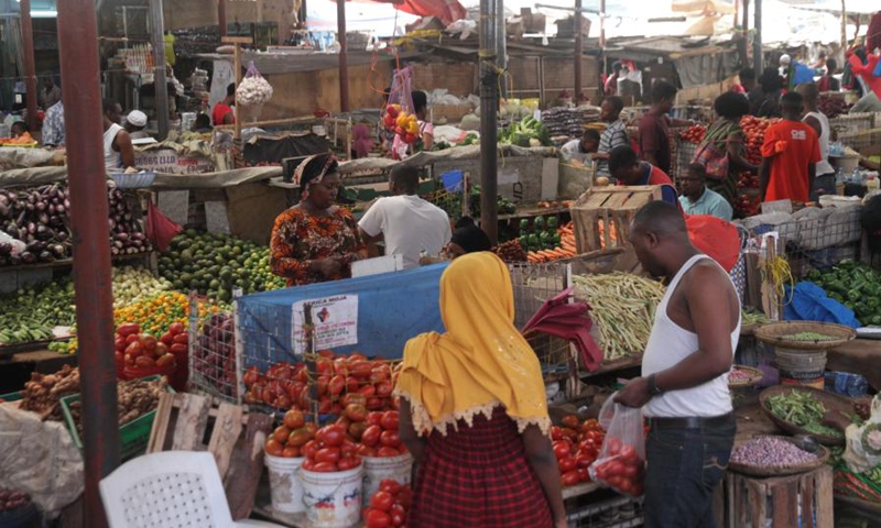 People shop at a market in Dar es Salaam, Tanzania, July 4, 2020.(Photo: Xinhua)