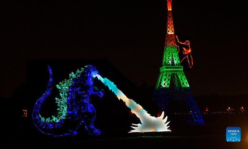 Handcrafted pumpkin carvings are seen during the 2021 Pumpkins After Dark drive-thru event in Milton, Canada, on Sep 17, 2021. Featuring thousands of hand-carved pumpkins and live carving demonstrations in a 2.5-kilometer tour, the drive-thru event is held from Sep 17 to Nov 8.Photo:Xinhua