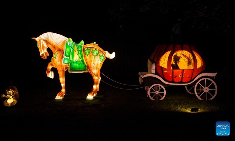 Handcrafted pumpkin carvings are seen during the 2021 Pumpkins After Dark drive-thru event in Milton, Canada, on Sep 17, 2021. Featuring thousands of hand-carved pumpkins and live carving demonstrations in a 2.5-kilometer tour, the drive-thru event is held from Sep 17 to Nov 8.Photo:Xinhua