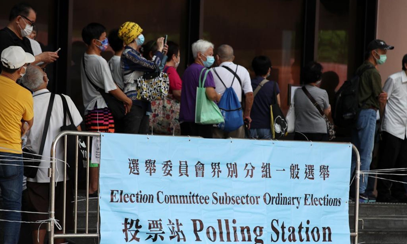 Citizens queue to enter a polling station at the Sha Tin Town Hall in south China's Hong Kong, Sept. 19, 2021. The 2021 Election Committee's subsector ordinary elections in China's Hong Kong Special Administrative Region (HKSAR) started on Sunday morning, the first election after the improvements to Hong Kong's electoral system earlier this year.Photo: Xinhua