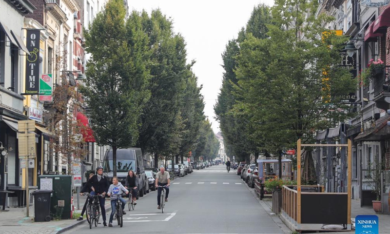 People ride bikes on Car Free Sunday in Brussels, Belgium, Sept. 19, 2021. The Car Free Sunday is valid for the public, except taxis, journey buses, emergency services, police and persons with a special permit. The whole Brussels Region is closed for traffic from 9:30 a.m. till 7 pm.  Photo: Xinhua