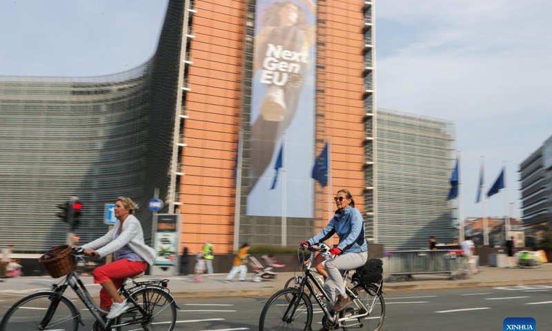 People ride bikes on Car Free Sunday in Brussels, Belgium, Sept. 19, 2021. The Car Free Sunday is valid for the public, except taxis, journey buses, emergency services, police and persons with a special permit. The whole Brussels Region is closed for traffic from 9:30 a.m. till 7 pm.  Photo: Xinhua