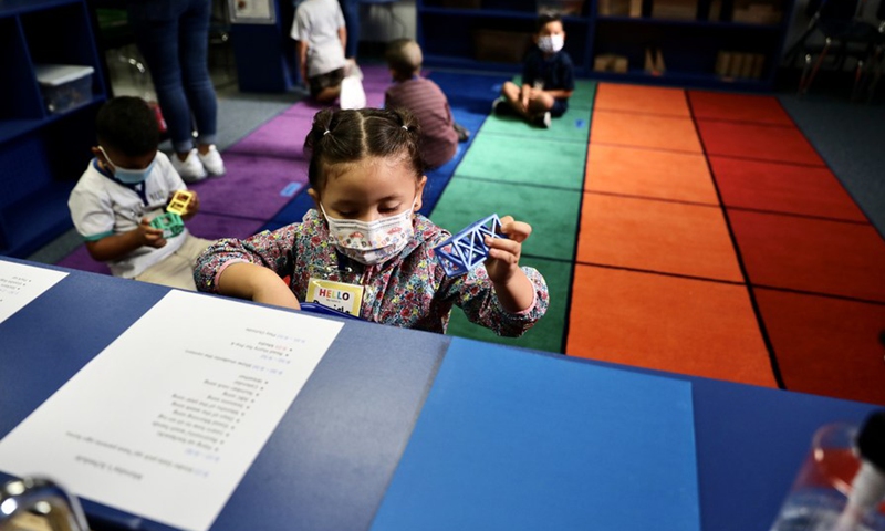 Kindergarten children play toys in a classroom at Montrara Ave. Elementary School in Los Angeles, California, the United States, on Aug. 16, 2021. (Photo: Xinhua)
