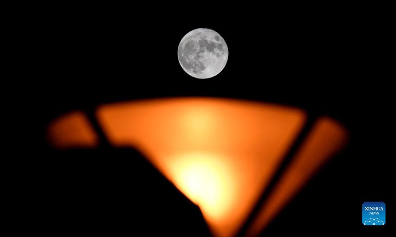 A full moon is seen in Zhengzhou, central China's Henan Province, Sept. 21, 2021.(Photo: Xinhua)