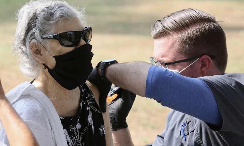 A woman takes the COVID-19 booster shot at the Tournament House in Pasadena, Los Angeles County, California, the United States, Aug. 19, 2021.(Photo: Xinhua)