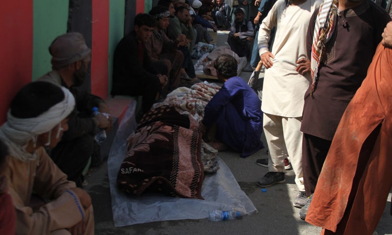 Photo taken on Sept. 29, 2019 shows people gathering around bodies of civilians who were killed in an airstrike by U.S.-led forces in Ghazni province, Afghanistan.(Photo: Xinhua)