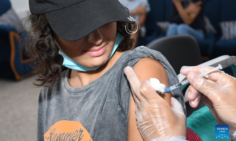 A teenager receives a dose of the COVID-19 vaccine in Sale, Morocco, on Sept. 21, 2021. Morocco has begun vaccinating teenagers aged between 12 and 17 years old against COVID-19.(Photo: Xinhua)