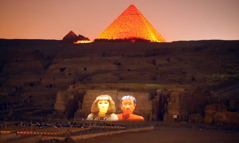Tourists enjoy the sound and light show at the Pyramids of Giza scenic spot, Egypt, on Sept. 27, 2021.(Photo: Xinhua)