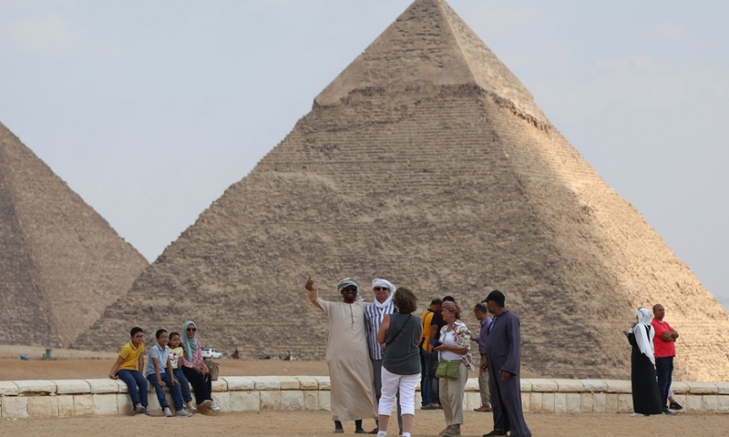 Tourists visit the Pyramids of Giza, Egypt, on Sept. 27, 2021.(Photo: Xinhua)
