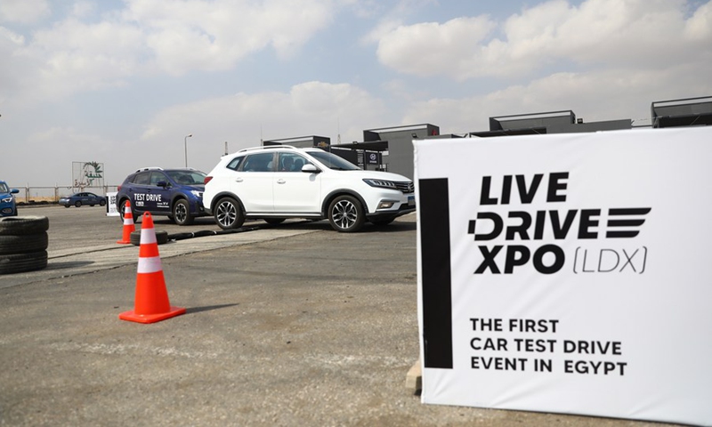 Clients test cars during the Live Drive Expo (LDX), a car test drive exhibition, held in New Cairo of Egypt, Sept. 24, 2021.(Photo: Xinhua)