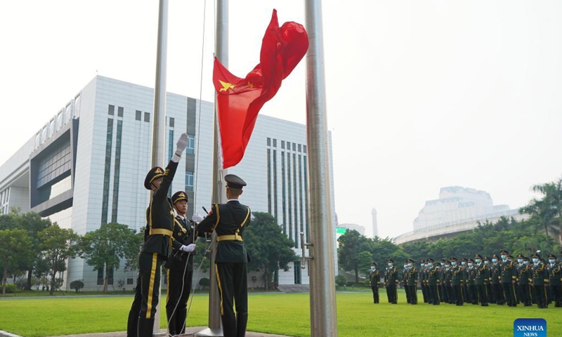 The Chinese People's Liberation Army (PLA) Garrison in the Macao Special Administrative Region holds a flag-raising ceremony to celebrate the 72nd anniversary of the founding of the People's Republic of China in Macao, south China, Oct. 1, 2021. Photo: Xinhua