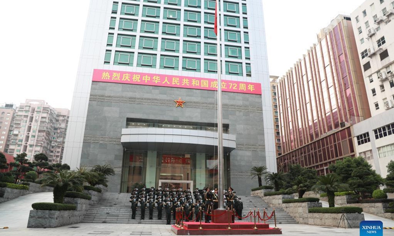 The Chinese People's Liberation Army (PLA) Garrison in the Macao Special Administrative Region holds a flag-raising ceremony to celebrate the 72nd anniversary of the founding of the People's Republic of China in Macao, south China, Oct. 1, 2021. Photo: Xinhua