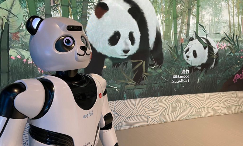 Photo taken on Oct. 1, 2021 shows a panda robot at the China Pavilion of Expo 2020 Dubai in Dubai, the United Arab Emirates. Covering an area of 4,636 square meters, the China Pavilion was designed with inspiration drawn from the traditional Chinese lantern, symbolizing hope, light and gathering.Photo:Xinhua