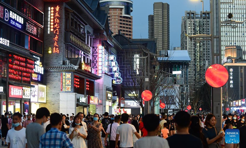 Citizens walk on Huaihe Road in Hefei, east China's Anhui Province, Oct. 1, 2021.Photo:Xinhua