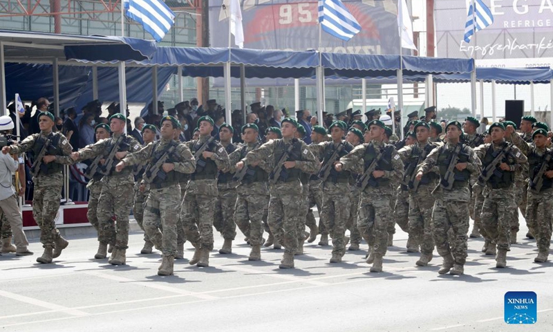 Soldiers of Cypriot National Guard march on a military parade celebrating the 61st Independence Day of Cyprus in Nicosia, Cyprus, on Oct. 1, 2021.Photo:Xinhua
