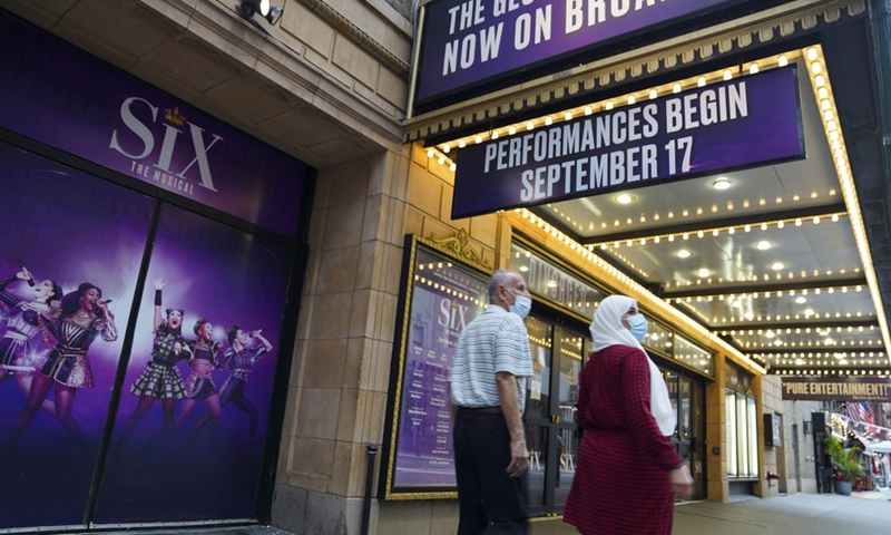 Pedestrians walk past a broadway theater in New York, the United States, July 2, 2021.(Photo: Xinhua)