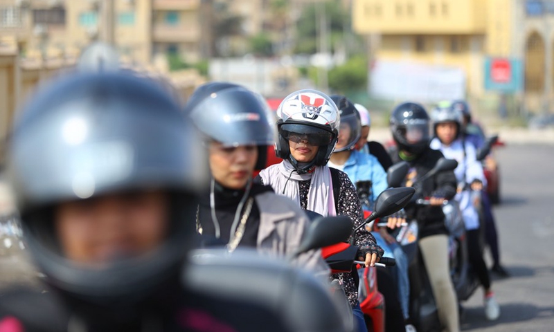 Egyptian female bikers take part in a motorcycle riding event in Cairo, Egypt, on Oct. 1, 2021.(Photo: Xinhua)