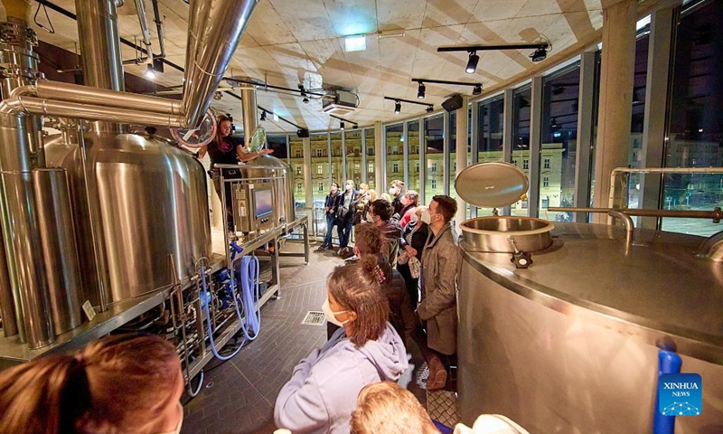 People visit the Ottakringer Brewery in Vienna, Austria, on Oct. 2, 2021. The Ottakringer Brewery was transformed into a museum for one night to greet visitors as part of the Long Night of Museums on Saturday. Around 640 museums, galleries, and cultural institutions presented their collections and exhibitions during the Long Night of Museums.(Photo: Xinhua)