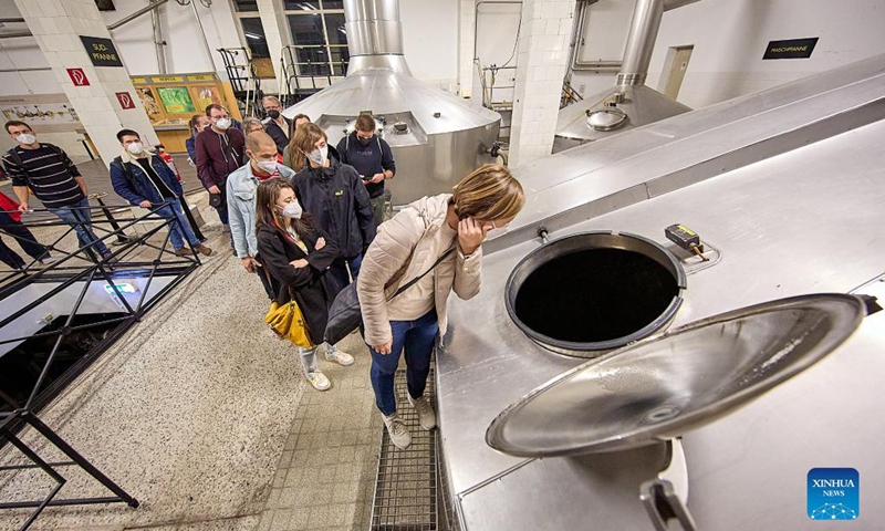 People visit the Ottakringer Brewery in Vienna, Austria, on Oct. 2, 2021. The Ottakringer Brewery was transformed into a museum for one night to greet visitors as part of the Long Night of Museums on Saturday. Around 640 museums, galleries, and cultural institutions presented their collections and exhibitions during the Long Night of Museums.(Photo: Xinhua)