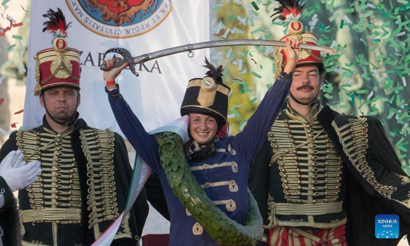 Nikolett Szabo (C) of Hungary celebrates at the National Gallop equestrian festival in Budapest, Hungary, on Oct. 3, 2021. (Photo by Attila Volgyi/Xinhua)