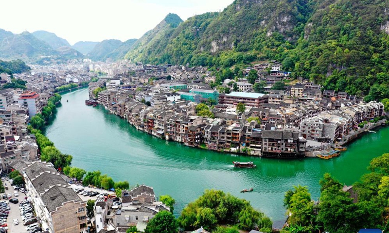 Aerial photo taken on Oct. 3, 2021 shows a view of Zhenyuan ancient city in Qiandongnan Miao and Dong autonomous prefecture, southwest China's Guizhou Province. (Photo by Zou Guangxue/Xinhua)