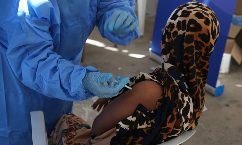 A woman receives a dose of COVID-19 vaccine in Tripoli, Libya, Oct. 6, 2021.(Photo: Xinhua)