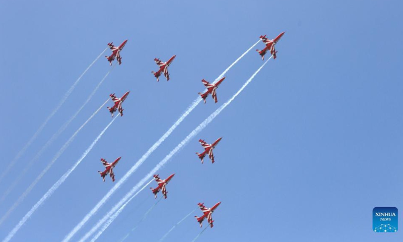 An Indian Air Force Suryakiran aircraft formation performs during the 89th Indian Air Force Day celebrations at Hindon Air Force station in Ghaziabad, India, Oct. 8, 2021.Photo:Xinhua
