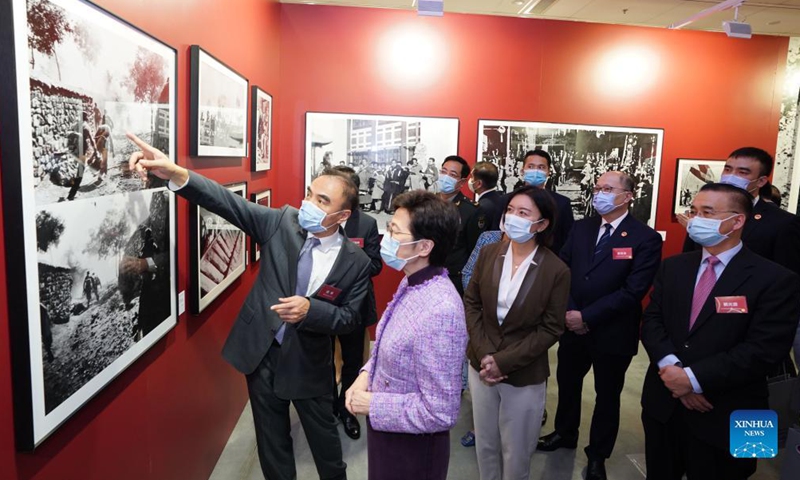 Chief Executive of China's Hong Kong Special Administrative Region (HKSAR) Carrie Lam and other guests visit a photo exhibition at Hong Kong Central Library in Hong Kong, south China, Oct. 8, 2021. Photo:Xinhua