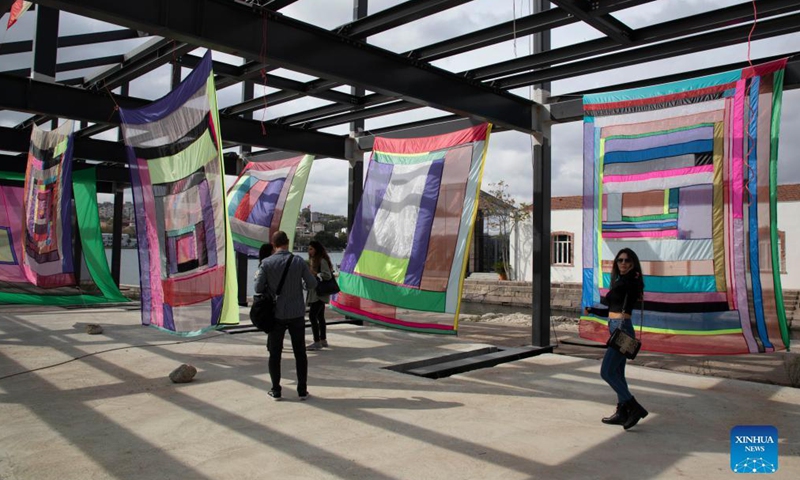 People visit the Contemporary Istanbul art fair in Istanbul,Turkey, on Oct. 8, 2021. Contemporary Istanbul, Turkey's leading art fair, hosted the 16th edition at its new venue, an ancient shipyard, amid the COVID-19 pandemic. The event, which kicked off on Tuesday, will run until Oct. 10. Photo:Xinhua