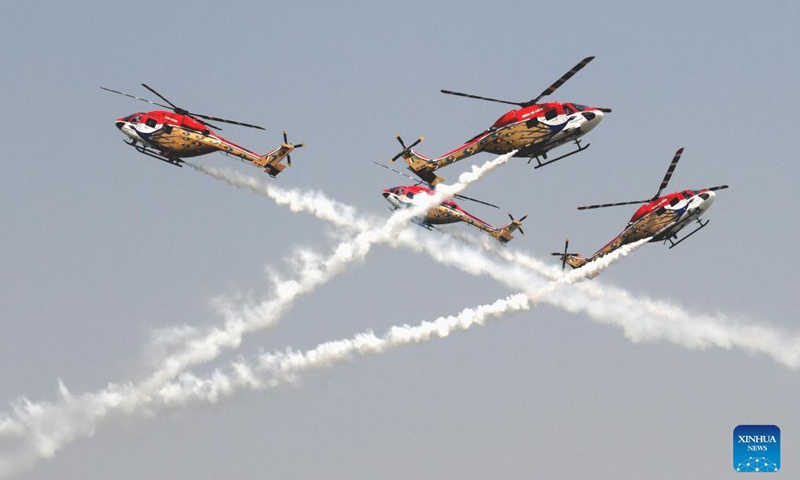 Indian Air Force's Sarang helicopters perform during the 89th Indian Air Force Day celebrations at Hindon Air Force station in Ghaziabad, India, Oct. 8, 2021.Photo:Xinhua