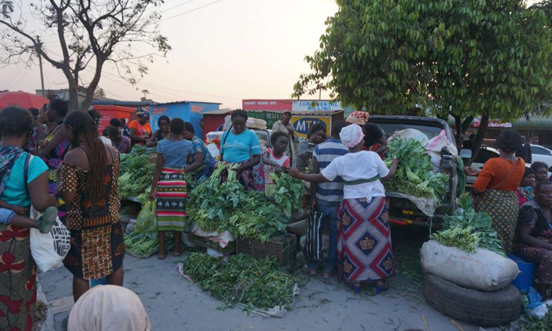 People are seen at a weekday market in Lusaka, Zambia, on Oct. 5, 2021.(Photo: Xinhua)