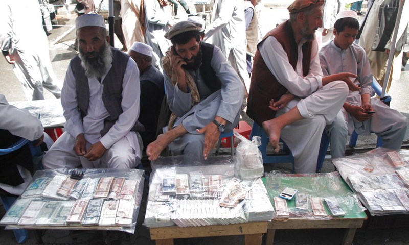 Afghan currency exchange dealers wait for customers in Kabul, capital of Afghanistan, Sept. 4, 2021.(Photo: Xinhua)