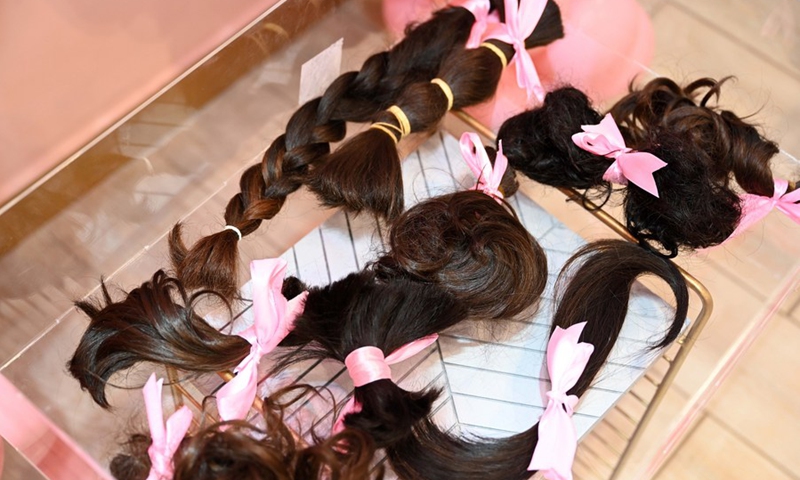 Donated hair is seen during a hair donation event in Hawalli Governorate, Kuwait, on Oct. 19, 2021.(Photo: Xinhua)