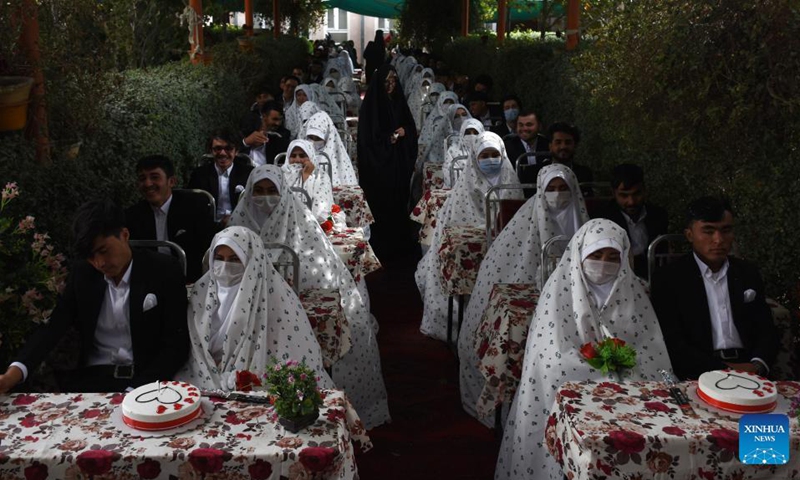 Afghan couples attend a mass wedding ceremony in Mazar-i-Sharif, capital of northern Balkh province, Afghanistan, Oct. 21, 2021.Photo:Xinhua
