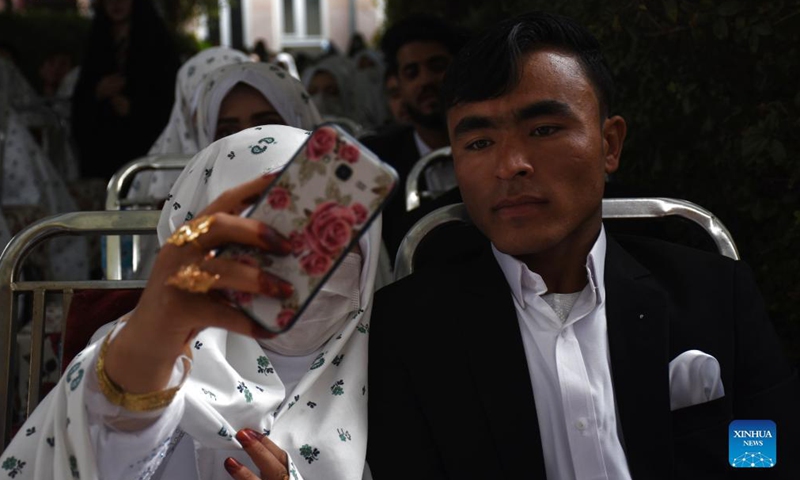 Afghan couples attend a mass wedding ceremony in Mazar-i-Sharif, capital of northern Balkh province, Afghanistan, Oct. 21, 2021.Photo:Xinhua