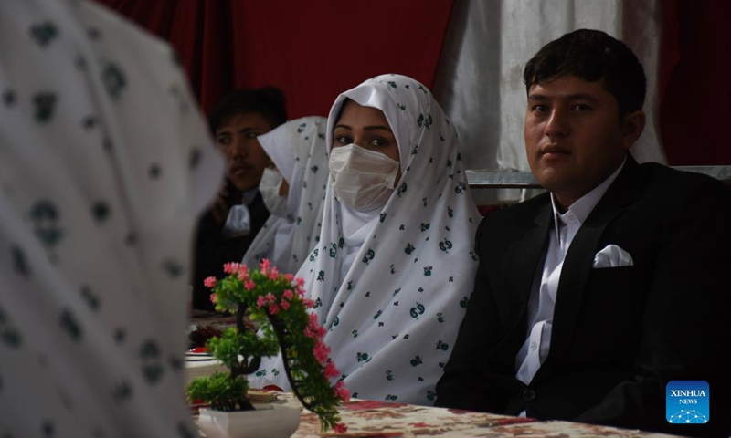 Afghan couples attend a mass wedding ceremony in Mazar-i-Sharif, capital of northern Balkh province, Afghanistan, Oct. 21, 2021.Photo:Xinhua