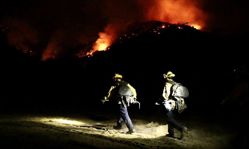 Firefighters work to contain the Alisal Fire in Santa Barbara County, California, the United States, Oct. 13, 2021.(Photo: Xinhua)