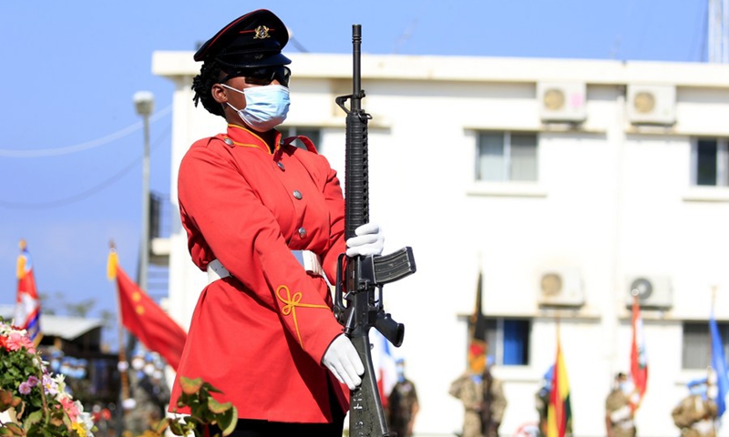 A female Ghanaian peacekeeper takes part in a military parade in celebration of the United Nations Day in Naqoura, south Lebanon on Oct. 25, 2021.(Photo: Xinhua) 