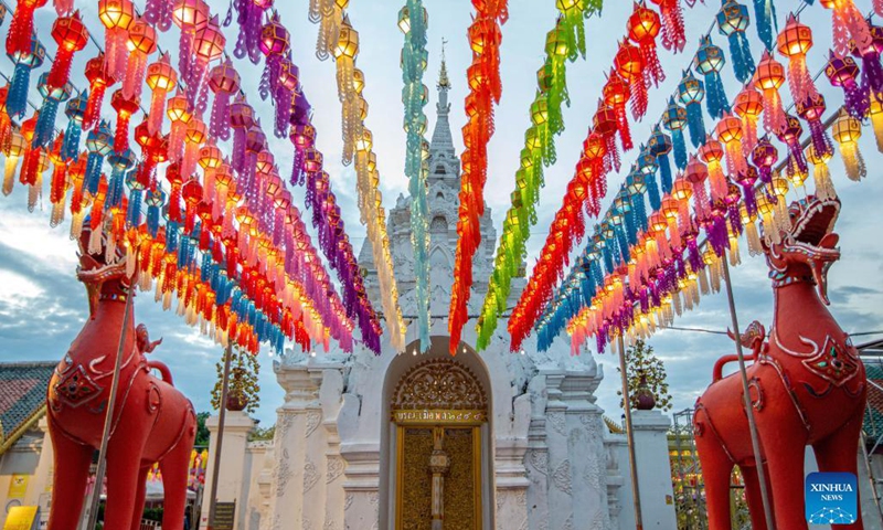 Colorful lanterns are seen at the Wat Phra That Hariphunchai in Lamphun, Thailand, Oct. 25, 2021. Lamphun Province of Thailand held a grand lantern festival at the Wat Phra That Hariphunchai, attracting tourists to hang lanterns and make wishes. (Photo: Xinhua)