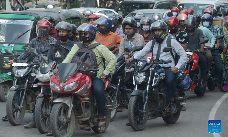 A street is packed with motorcycles in Dhaka, Bangladesh, Nov. 1, 2021. Commercial motorcycle ride services have once again returned to the streets of Dhaka as Bangladesh ended its COVID-19 lockdown recently.(Photo: Xinhua)