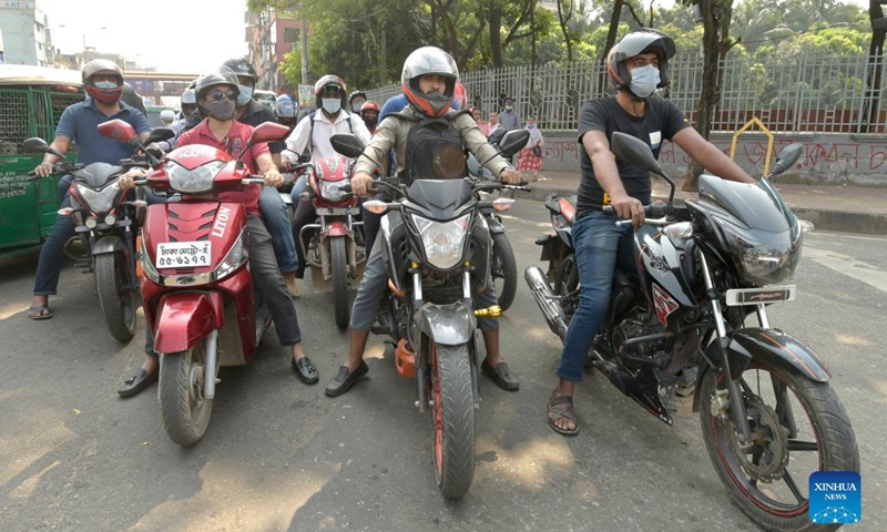 A street is packed with motorcycles in Dhaka, Bangladesh, Nov. 1, 2021. Commercial motorcycle ride services have once again returned to the streets of Dhaka as Bangladesh ended its COVID-19 lockdown recently.(Photo: Xinhua)