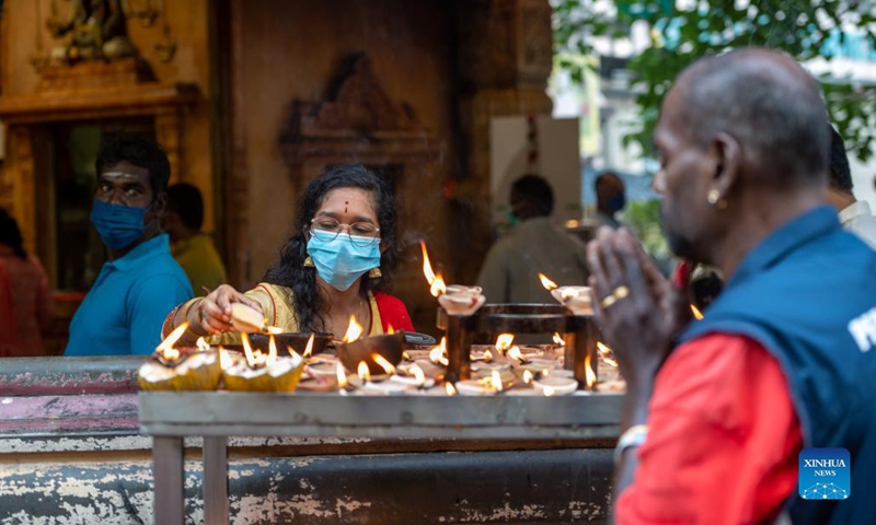 People pray at a temple on the occasion of Hindu festival Deepavali in Kuala Lumpur, Malaysia, Nov. 4, 2021.(Photo: Xinhua)