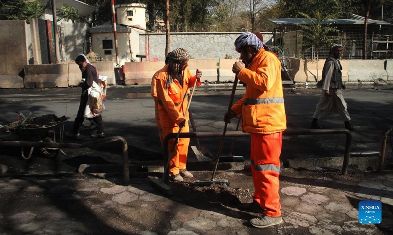 Workers clean the site of a terrorist attack in Kabul, Afghanistan, Nov. 3, 2021. The recent terrorist attacks, reportedly conducted by the affiliates of the Islamic States (IS) in Afghanistan, are spreading fear among Afghans believing that peace has returned following the change of regime in the war-torn country.(Photo: Xinhua)