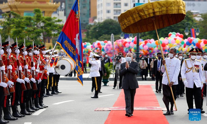Cambodian King Norodom Sihamoni inspects the guard of honor during the Independence Day celebration in Phnom Penh, Cambodia, Nov. 9, 2021. Cambodia on Tuesday marked the 68th anniversary of its independence from France in an hour-long ceremony held at the Independence Monument in the capital city Phnom Penh.(Photo: Xinhua)
