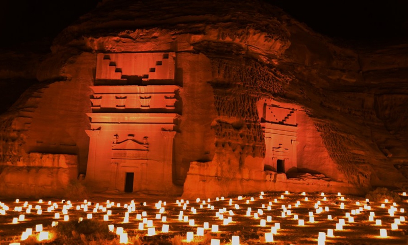 Photo taken on Nov. 4, 2021 shows Hegra, Saudi's first UNESCO World Heritage Site, in the light of candles in Alula, Saudi Arabia.(Photo: Xinhua)